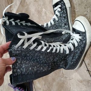 Convers sparkling knee high zip/lace up shoes.